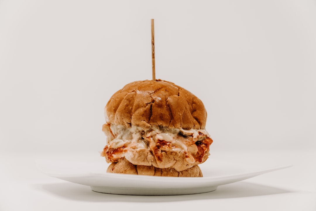 Pizza cheeseburger with melted mozzarella cheese and marinara sauce