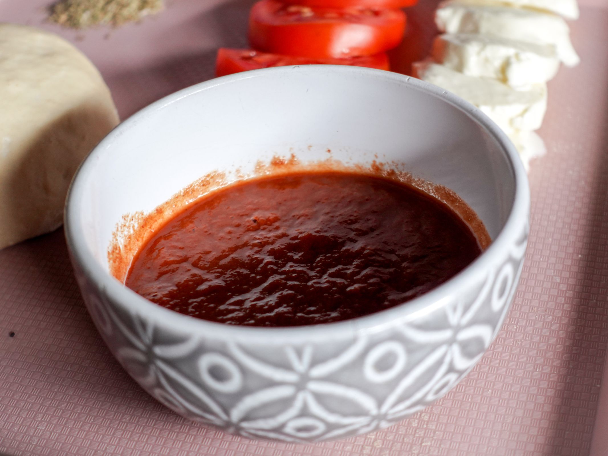 Marinara sauce, mozzarella, and tomatoes