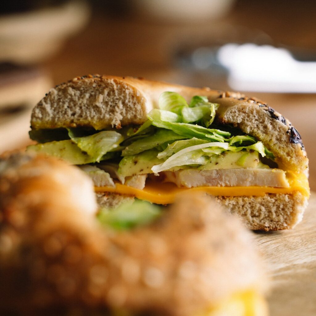 Turkey hoagie sandwich with American cheese and lettuce on a roll