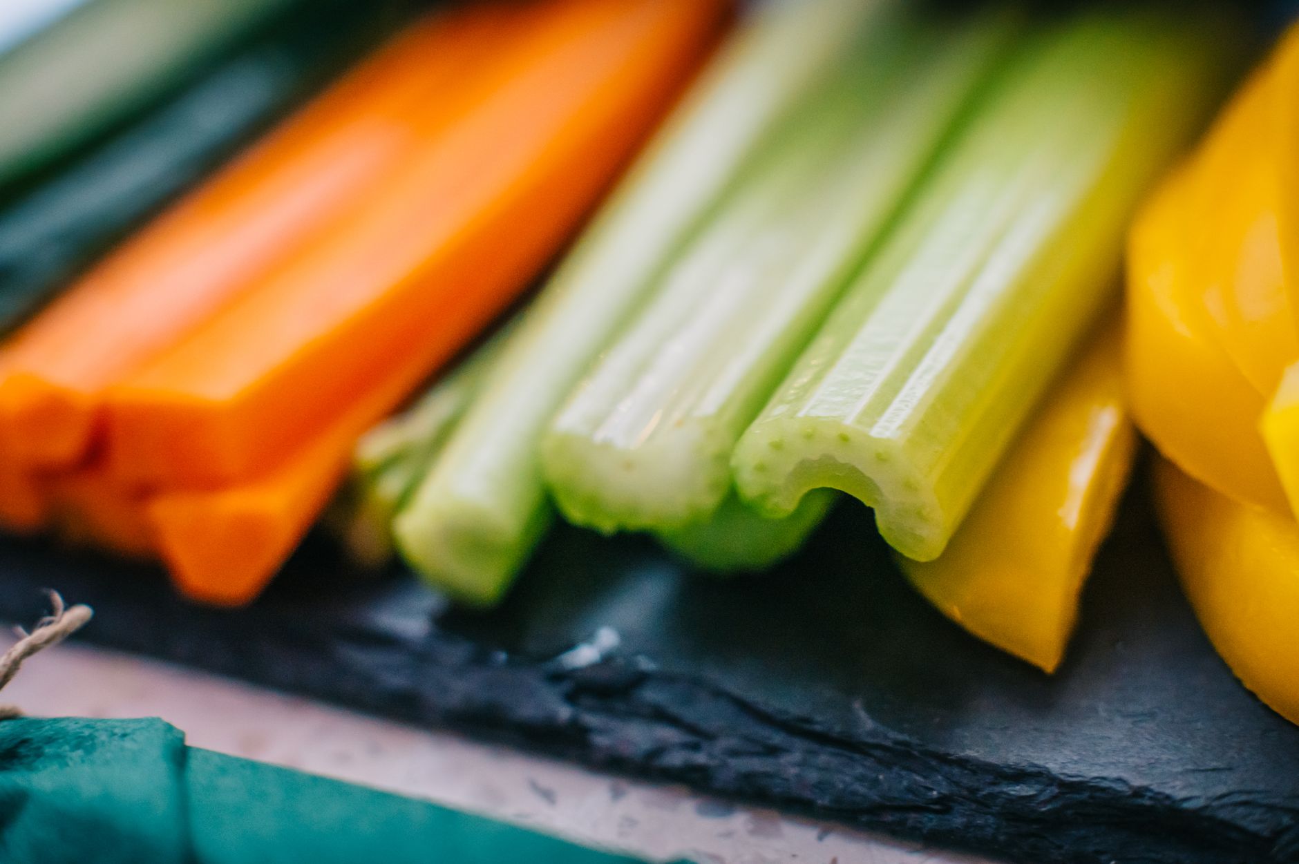 Fresh celery and carrot sticks close up