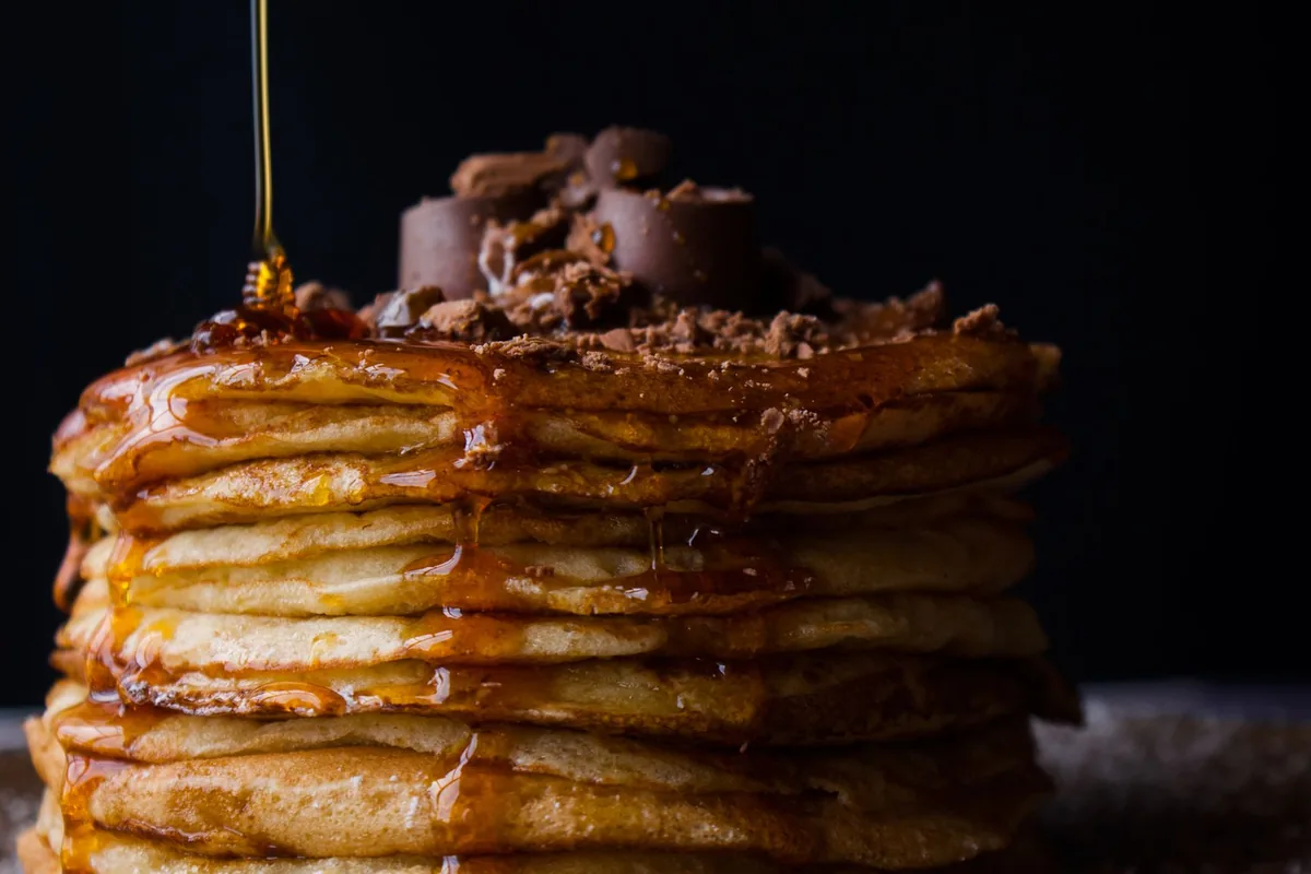 Pancakes stacked with syrup