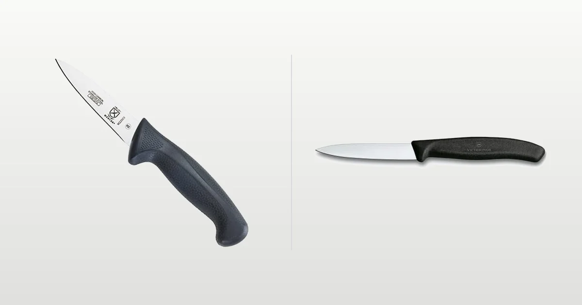 Bolsterless stainless paring knife beside a high-carbon Japanese paring knife
