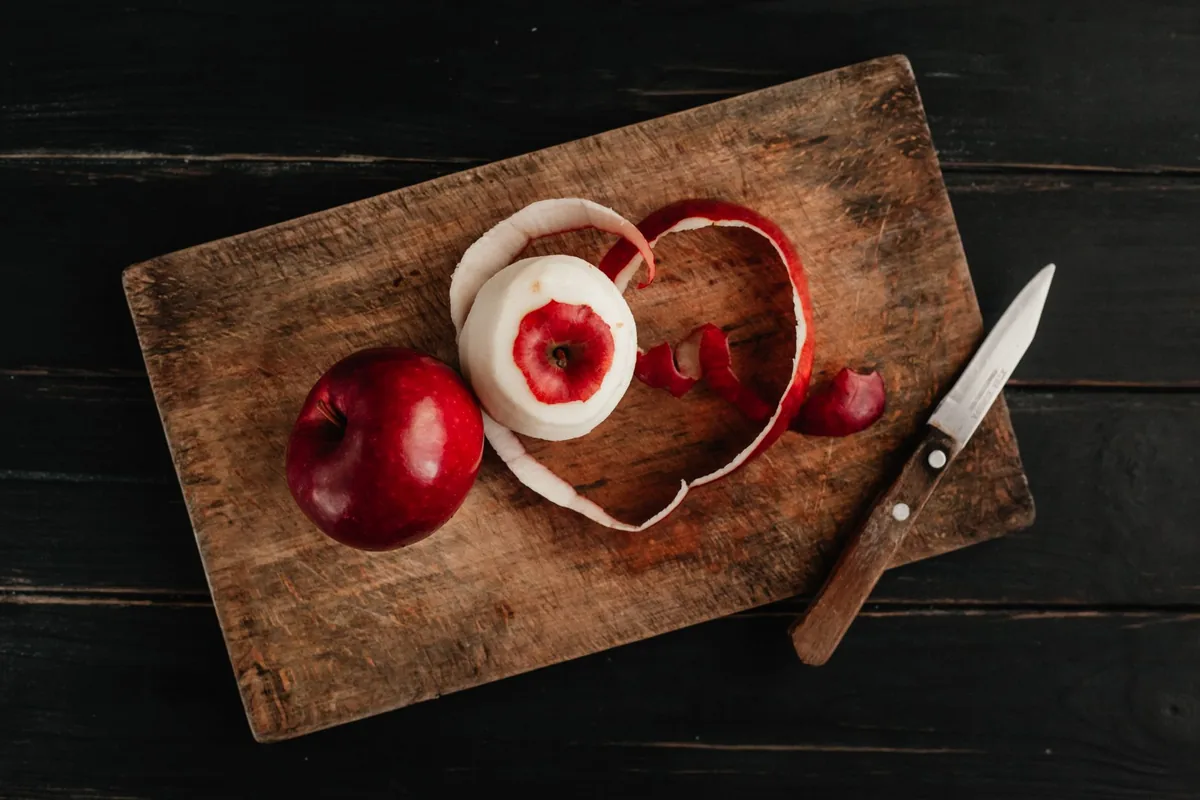 Peeling an apple by hand