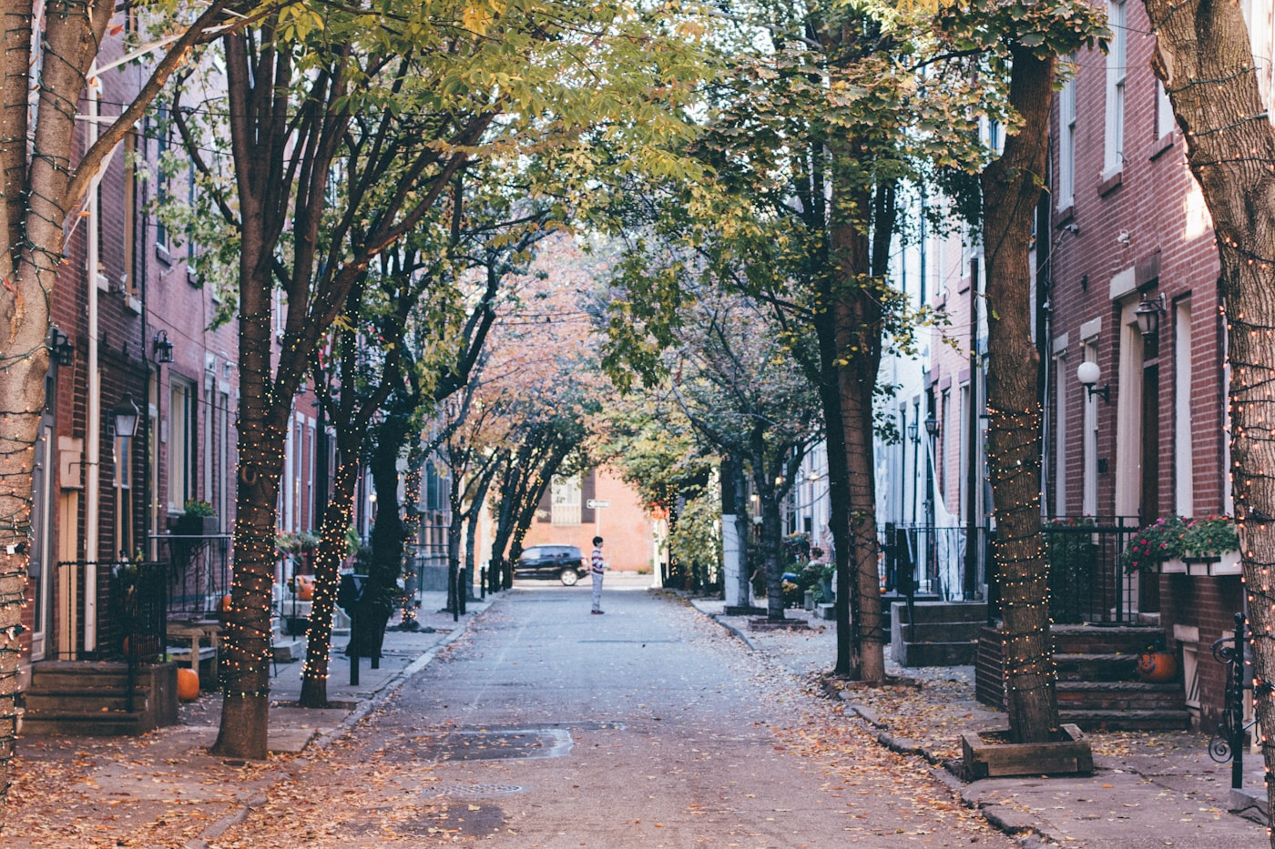 Tree-lined rowhome street near Frankford Avenue in Philadelphia