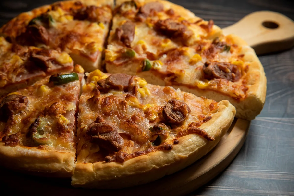Pizza slices on a baking tray
