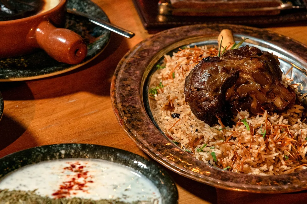 Lamb biryani served with rice and spices