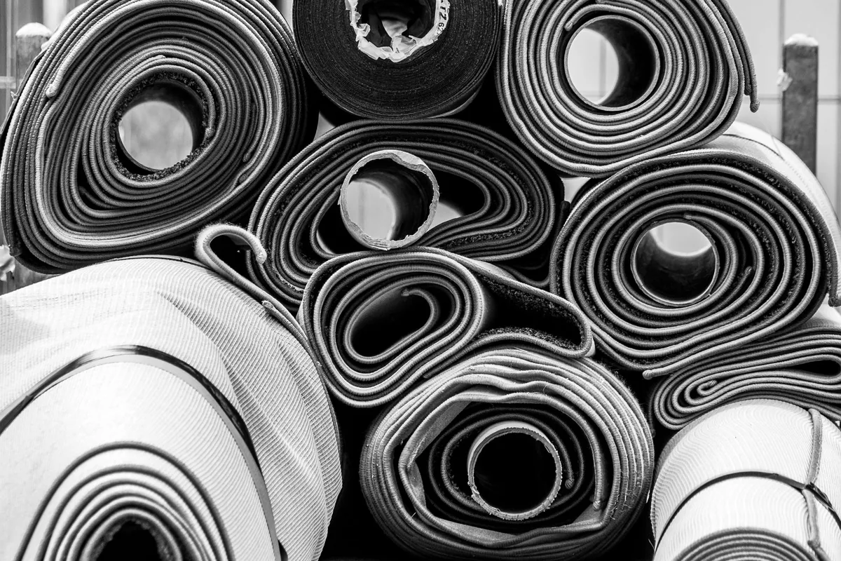 Rolls of carpet and underlay