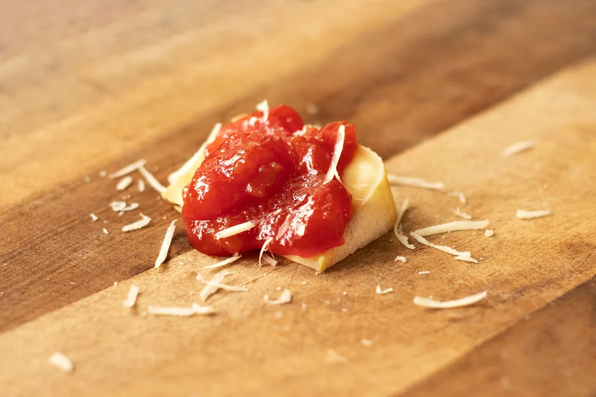 Shredded cheese on a board