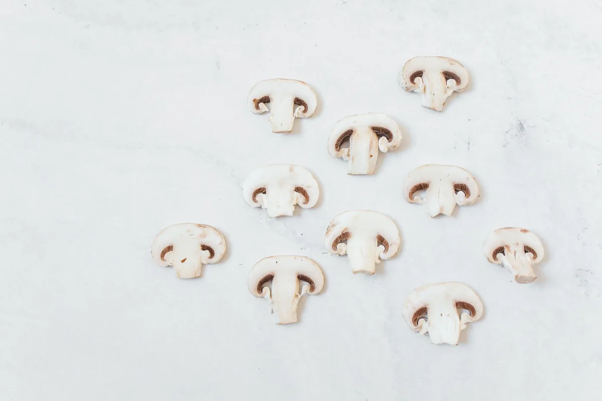 Sliced mushrooms laid out to dry