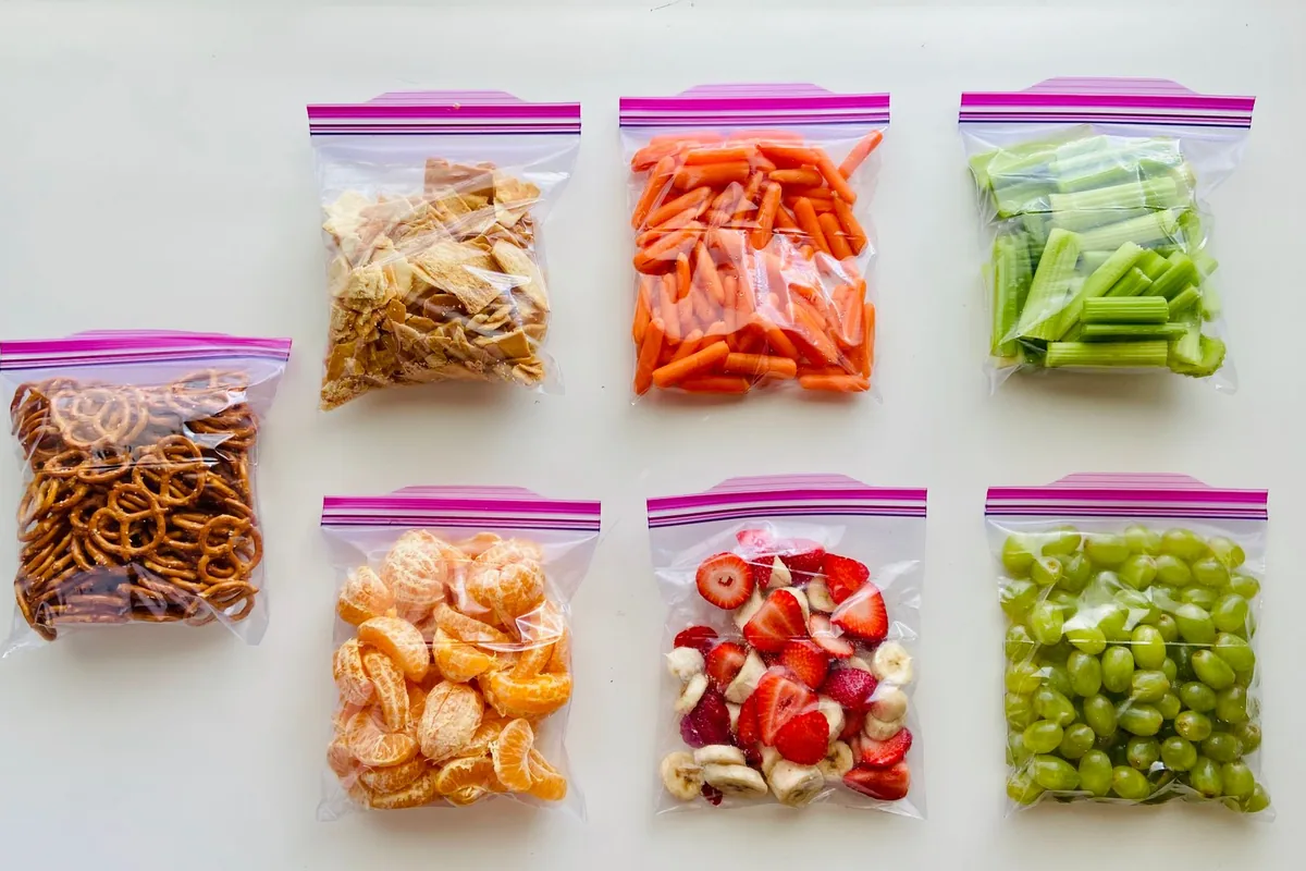 Fruit, vegetables and snacks packed in sealed bags