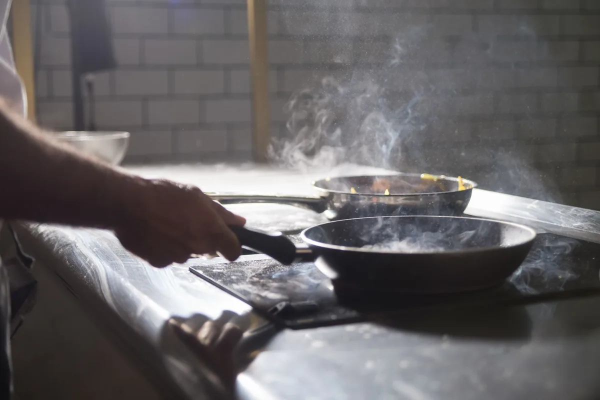 Smoke above a frying pan