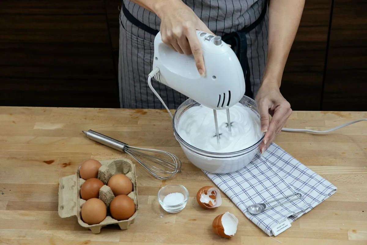 Stiff egg whites in a bowl