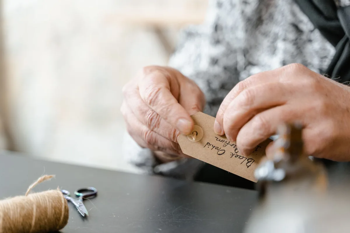 String being cut by hand
