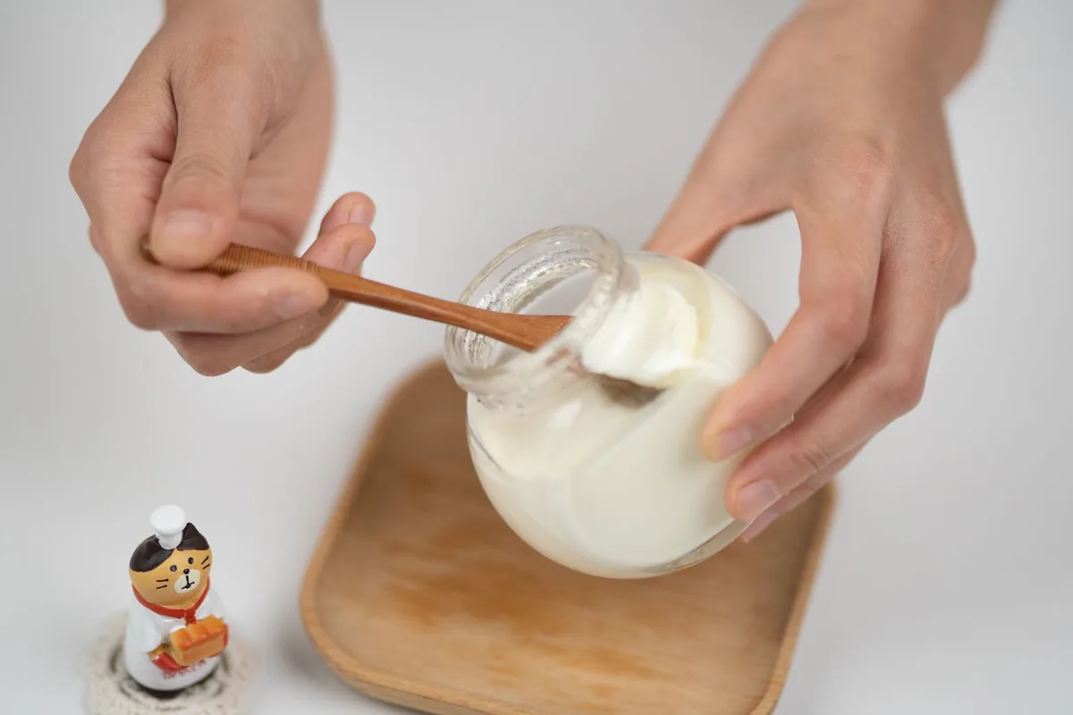 Thick strained Greek yogurt in a jar