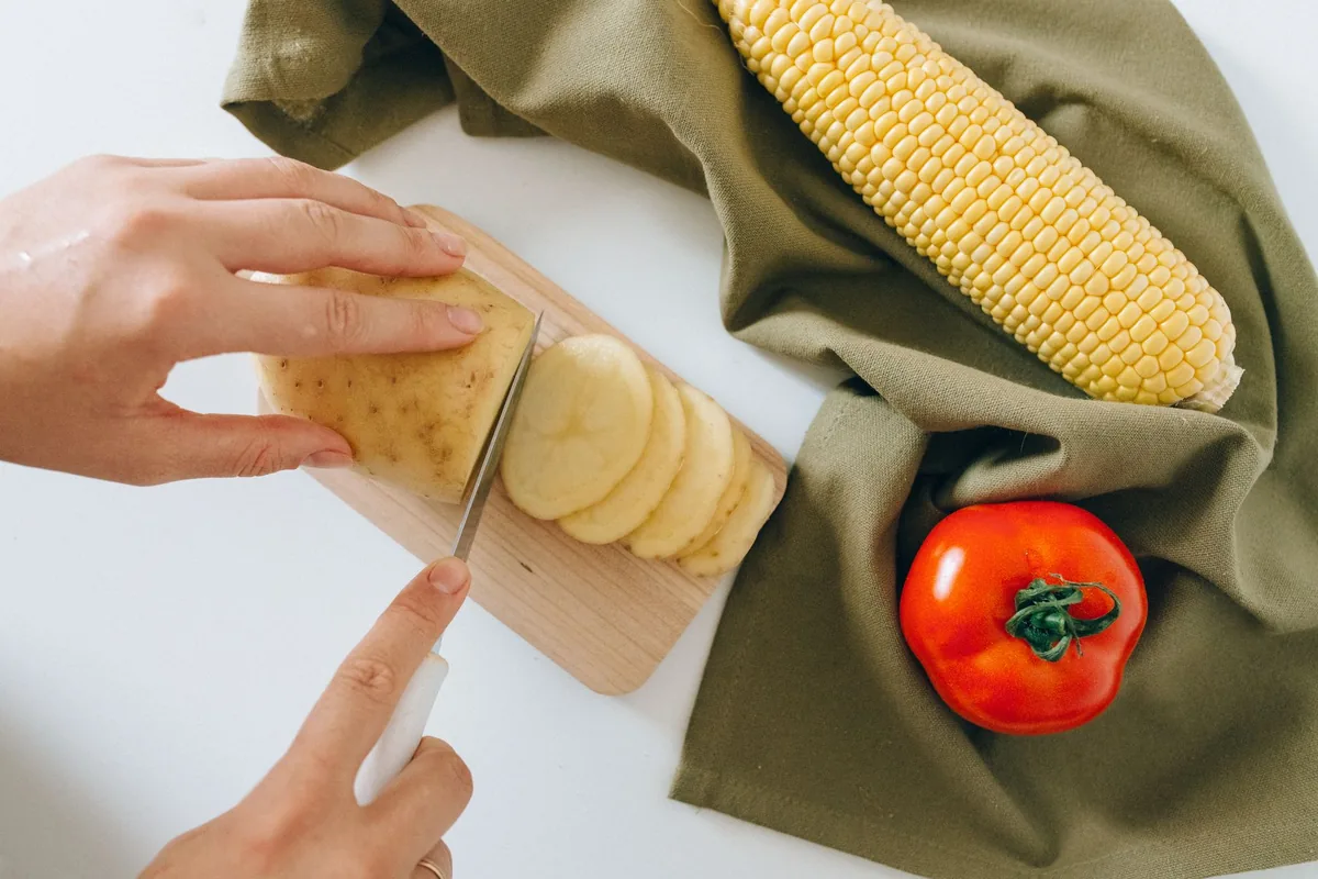 Thin potato slices on a board