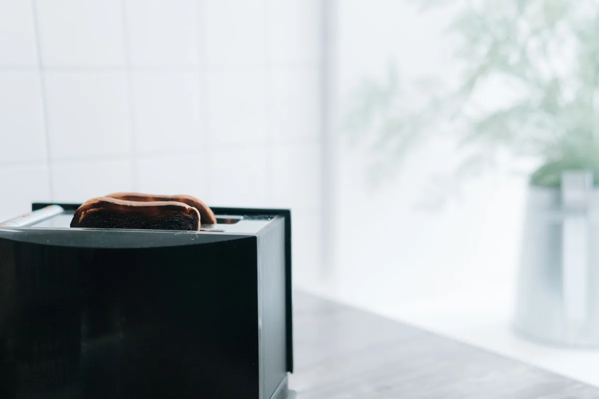 Toast popping out of a toaster