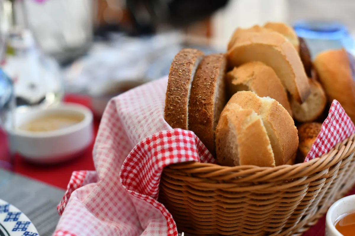 Assorted bread rolls in a wicker basket
