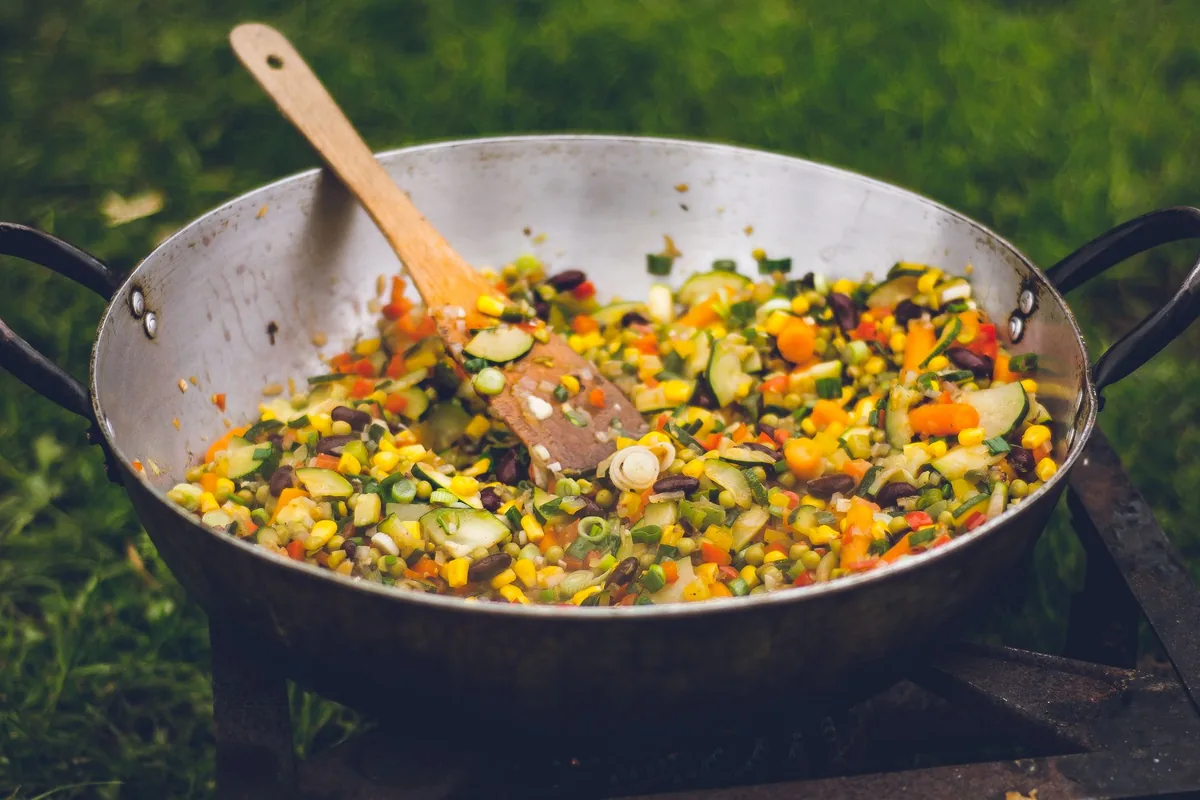 Vegetables frying in a skillet