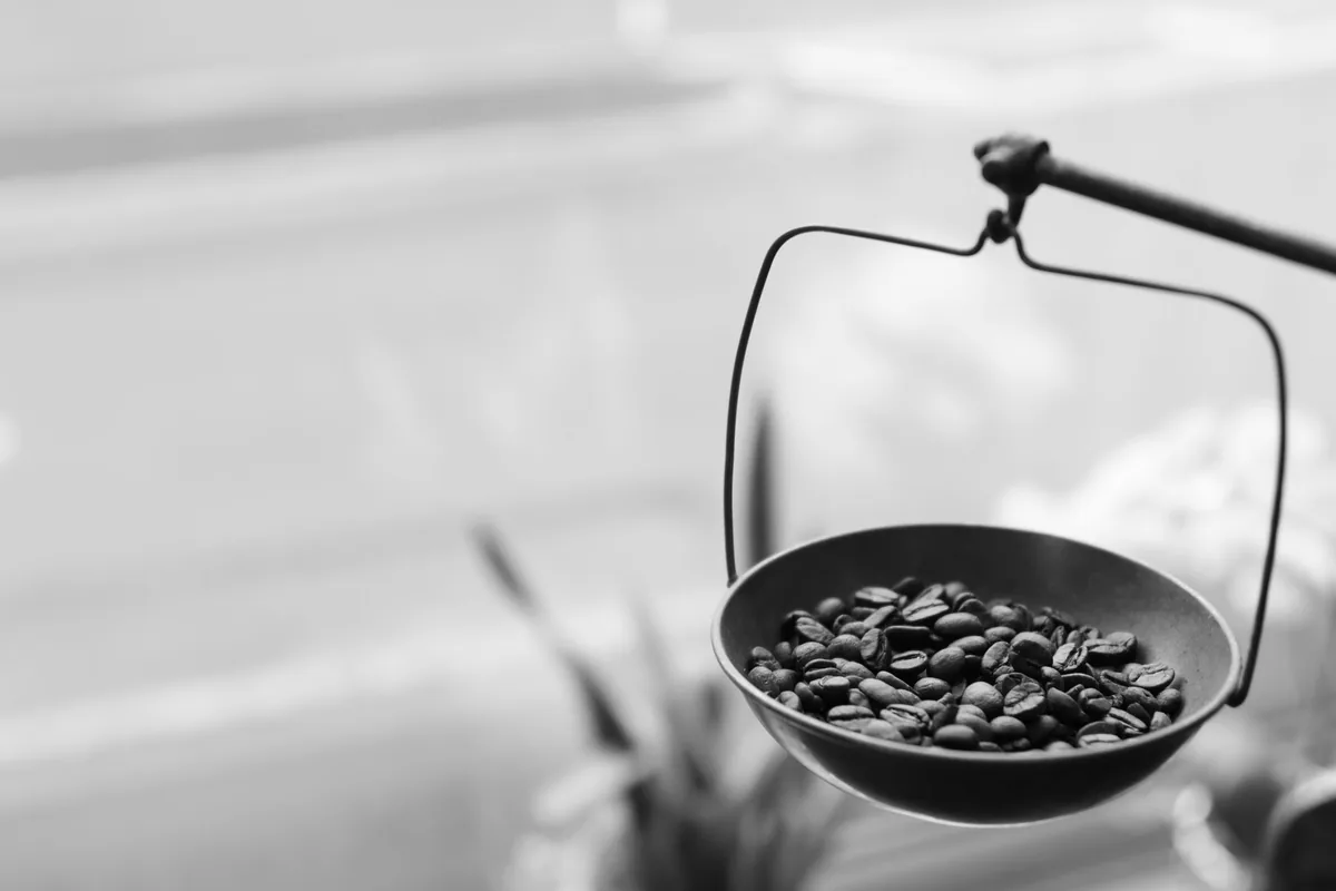 Weighing coffee beans for a brew