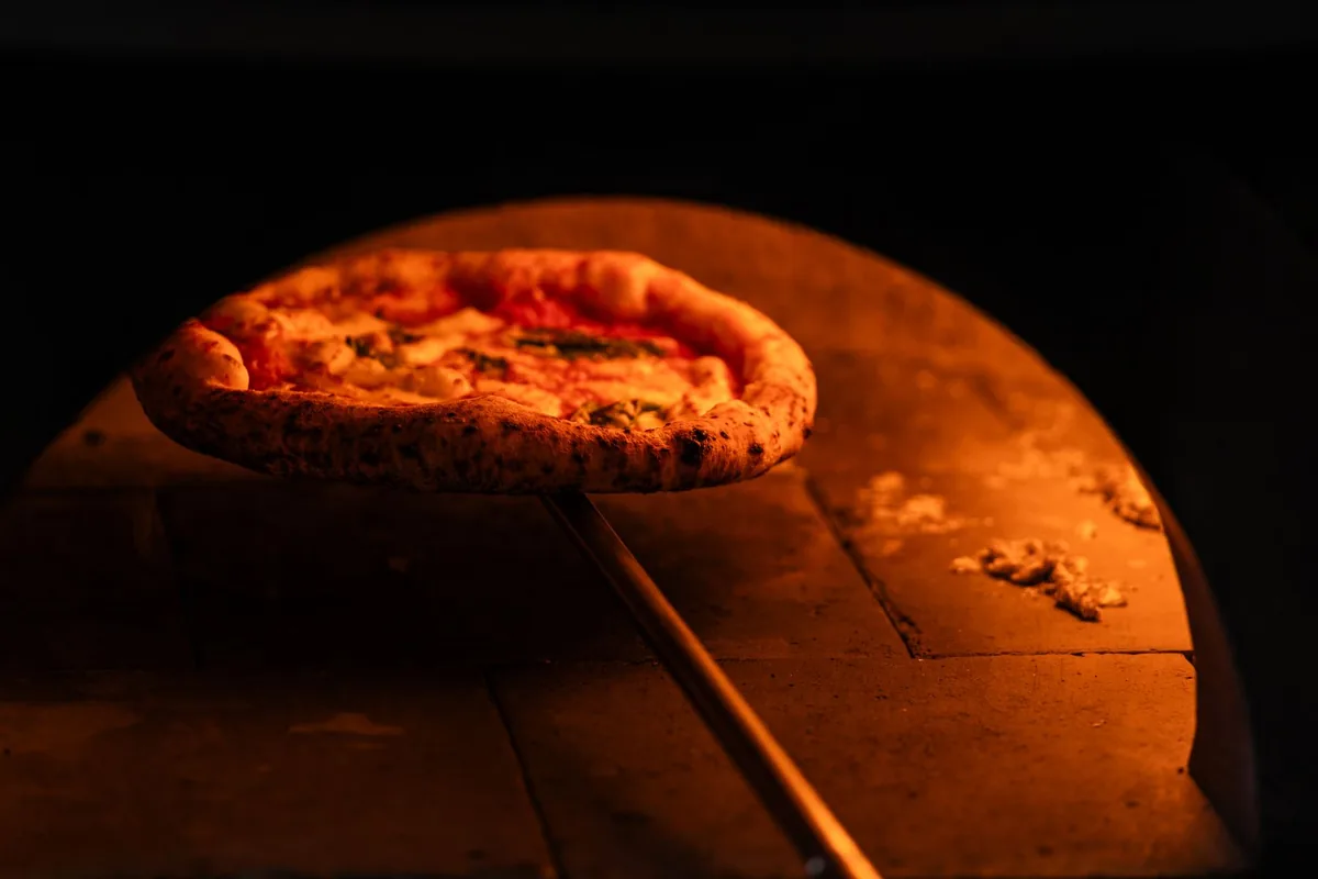 A blistered Neapolitan-style pizza fresh from the oven