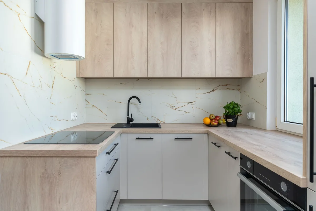 A light kitchen with a flush induction cooktop
