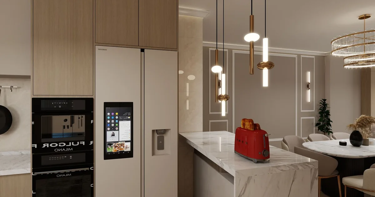 A modern kitchen with a red toaster on the island