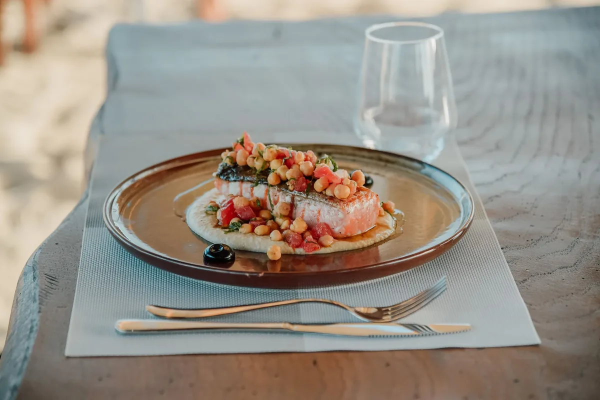 A plated salmon dish on a table