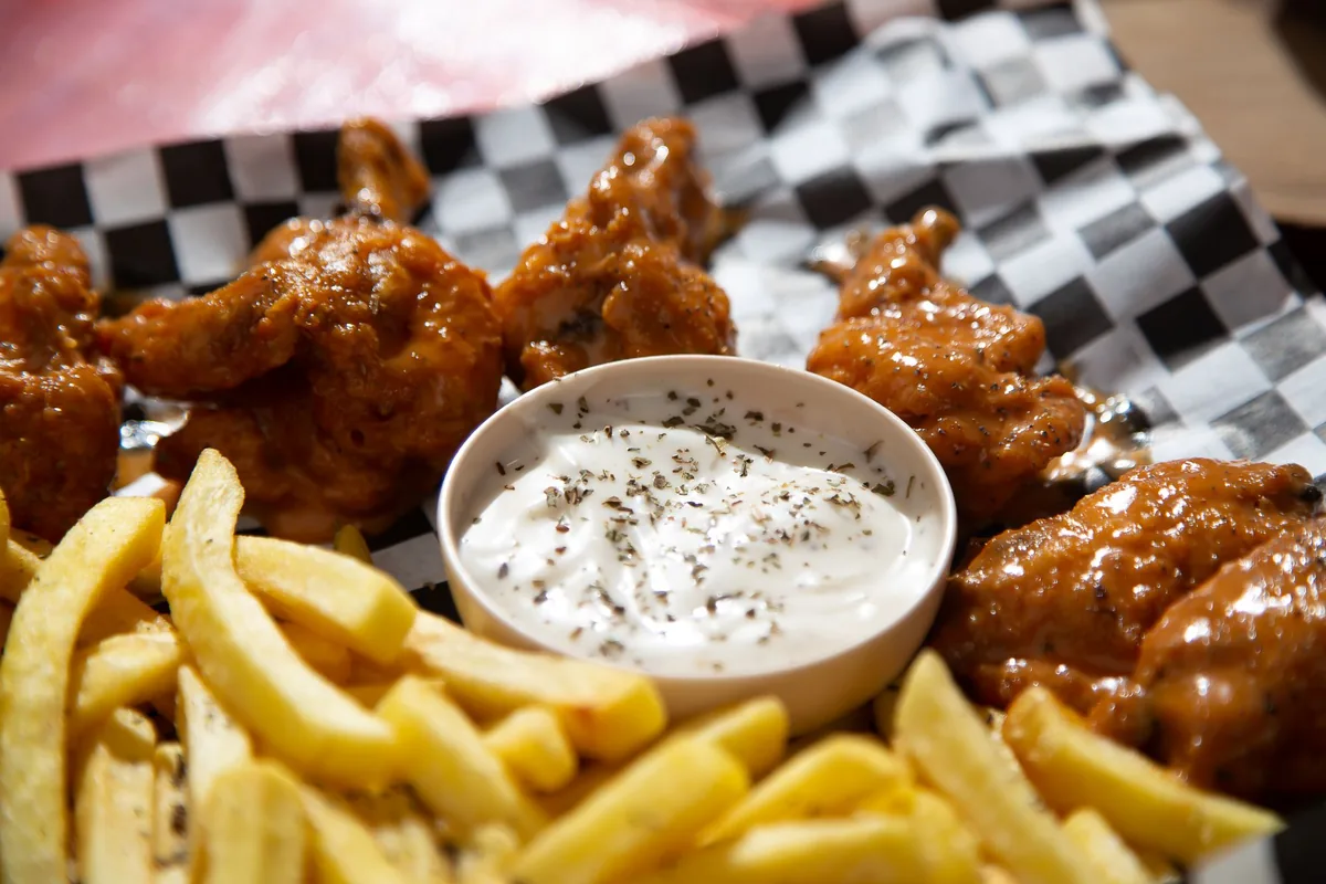Chicken wings served with a blue cheese dipping sauce