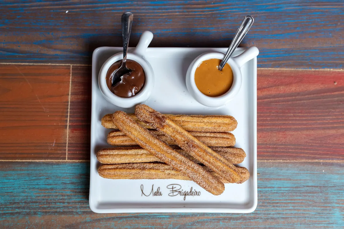 Cinnamon sugar pastry twists with a caramel dipping sauce
