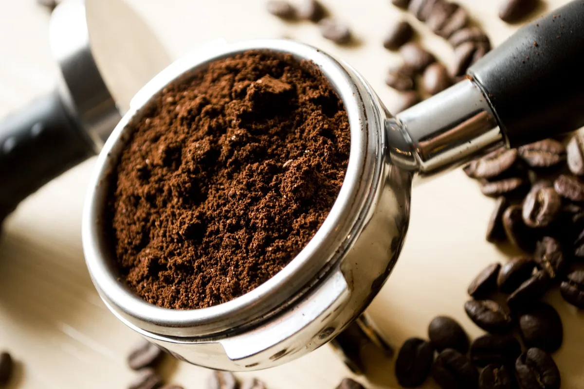Freshly ground coffee in an espresso portafilter basket