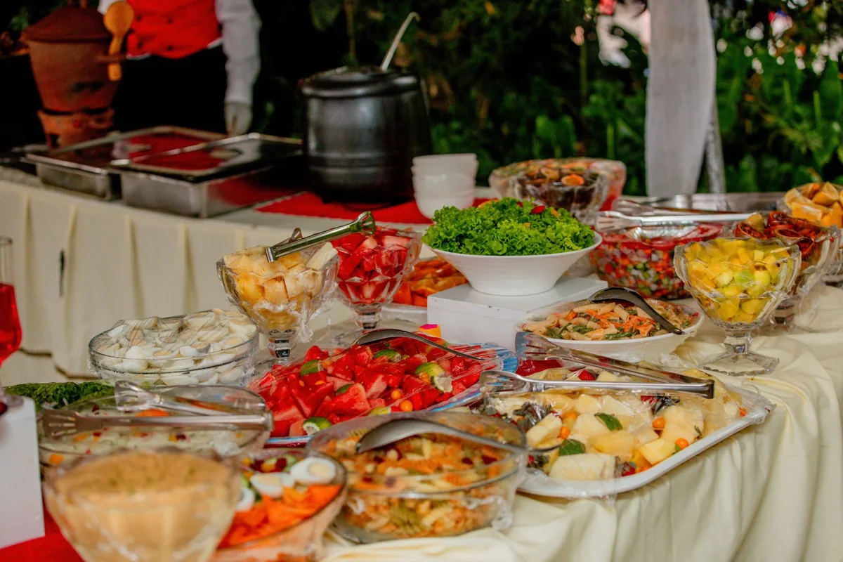 Holiday side dishes laid out in serving bowls on a buffet table