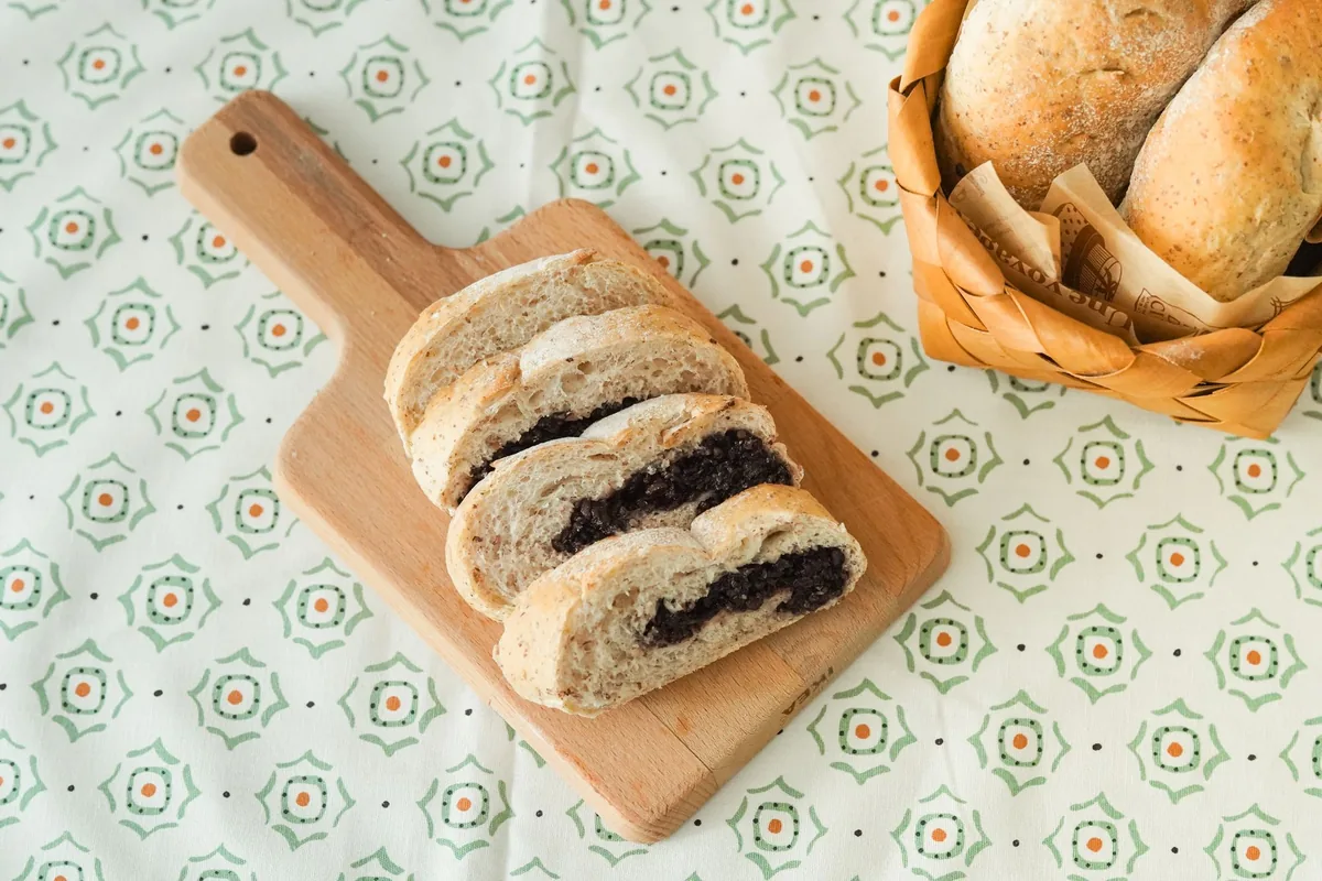 Sliced filled bread on a wooden board