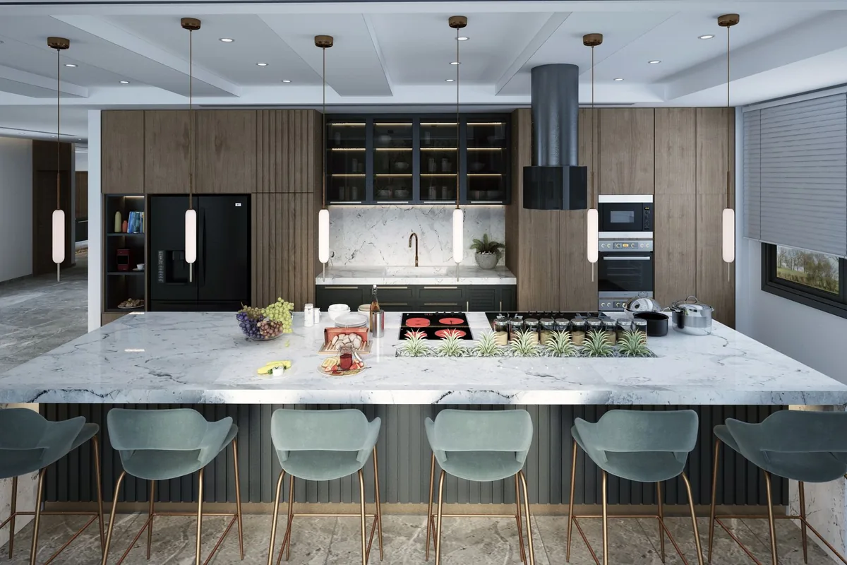 A large modern kitchen with a marble island and pendant lights
