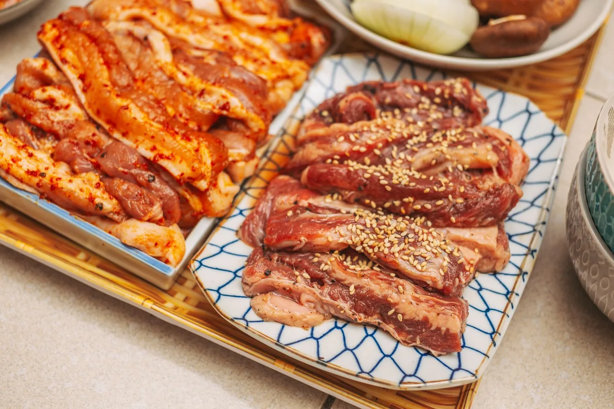 Trays of marinated meat ready for storage